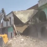 प्रशासन के अल्टीमेटम का असर! फुलत मदरसे में चला बुलडोजर, खुद हटाया सरकारी जमीन से अतिक्रमण