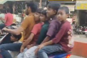 मुजफ्फरनगर में हद पार लापरवाही! एक स्कूटी पर 6 सवार, वायरल वीडियो ने उड़ाए होश; ट्रैफिक पुलिस पर उठे सवाल